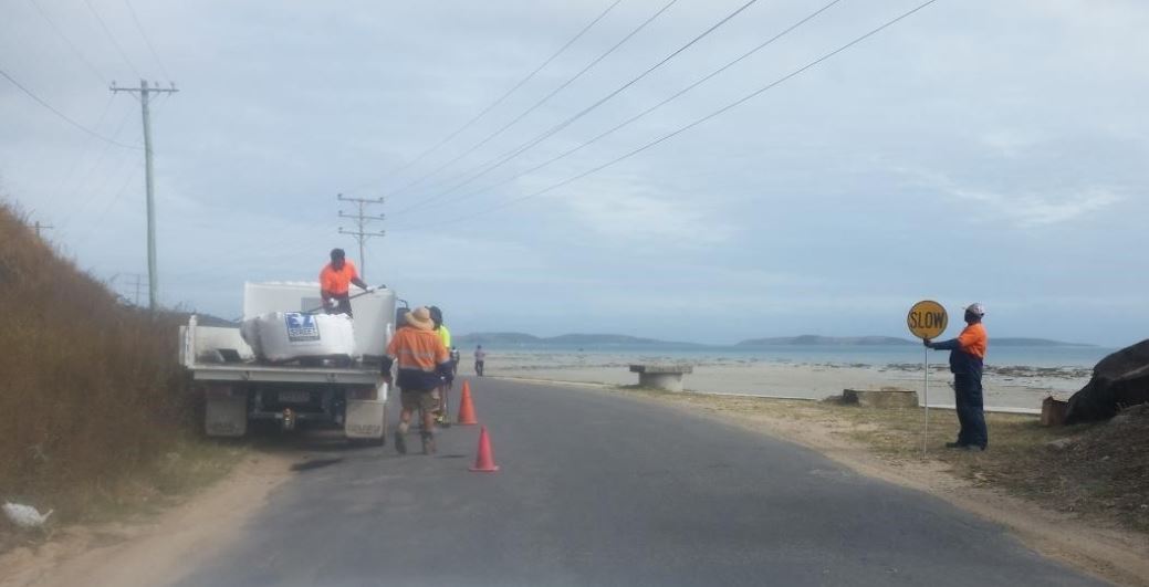 Road resealing crew